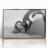 Framed wall art featuring a stylish gold-accented penguin design against a minimalist white background, perfect for enhancing modern home decor or children's rooms.