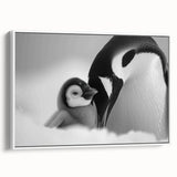 Framed canvas wall art featuring a charming penguin design, showcasing vibrant colors and a white border, perfect for adding a playful touch to any room's decor.