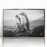 Framed wall art featuring a penguin design from the "Animals of the Wild" collection, showcasing vibrant colors and a sleek silver frame, ideal for enhancing modern decor.
