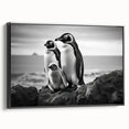 Framed canvas wall art showcasing a stylized black penguin design in a minimalist setting, ideal for modern home decor, bringing a touch of wildlife elegance.