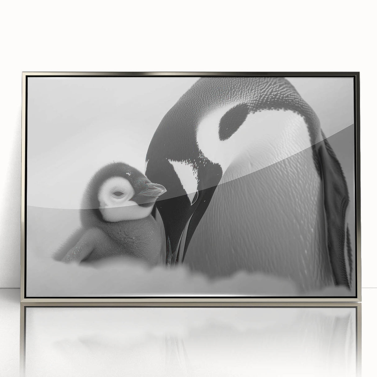 Framed wall art featuring a playful penguin design with a silver acrylic finish, ideal for adding a whimsical touch to modern decor, perfect for animal lovers.