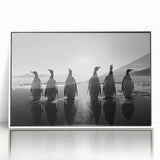 Framed wall art featuring a whimsical penguin design with vibrant colors, set against a sleek white background, perfect for adding a playful touch to any room.