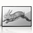 Framed acrylic wall art featuring a detailed black rabbit design, ideal for animal lovers. The sleek black frame enhances the elegant look of this wildlife-inspired piece.