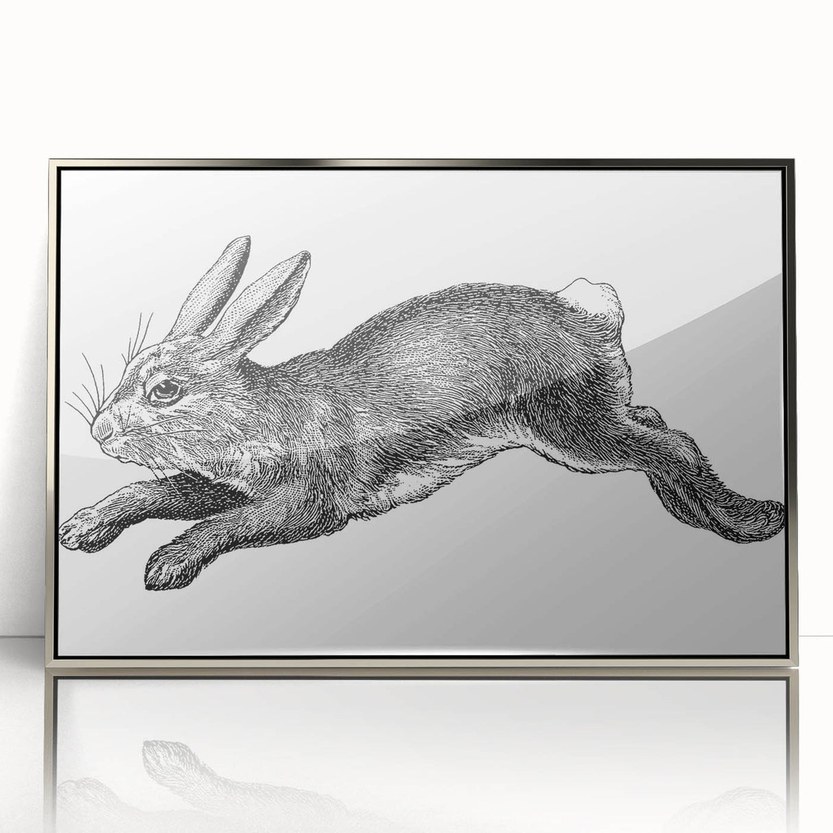 Framed wall art featuring a minimalist rabbit design in silver accents, set against a white background, ideal for modern home decor or animal-themed interiors.