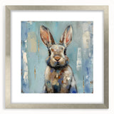 Framed wall art collection featuring a whimsical rabbit design in a silver frame, showcasing vibrant colors and intricate details, perfect for children's decor or animal lovers.