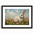 Framed wall art showcasing a whimsical rabbit design, featuring a sleek black frame and mat. Ideal for animal lovers and modern decor enthusiasts, this piece adds a playful touch to any room.