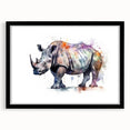 Black-framed wall art featuring a striking rhinoceros design, showcasing intricate details and textures, ideal for wildlife enthusiasts and home decor.