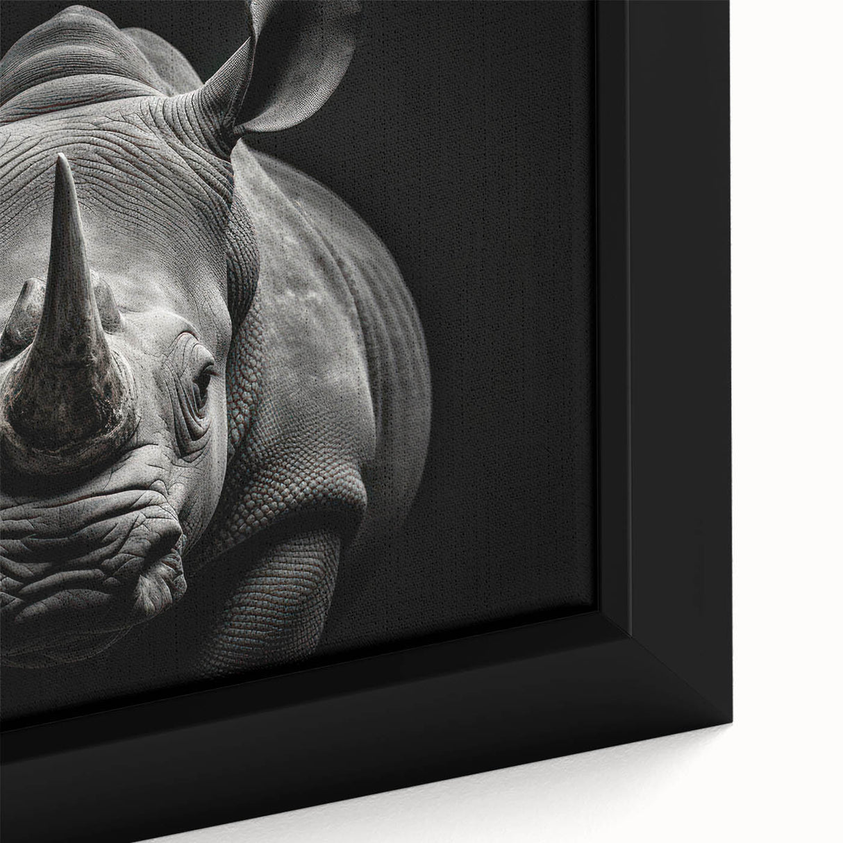Close-up of a framed canvas wall art featuring a realistic rhinoceros design against a vibrant background, capturing intricate textures and details, ideal for wildlife enthusiasts.