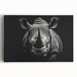 Front view of a striking stretched canvas wall art featuring a detailed rhinoceros design, showcasing rich colors and textures ideal for home decor. Perfect for wildlife enthusiasts and art collectors.