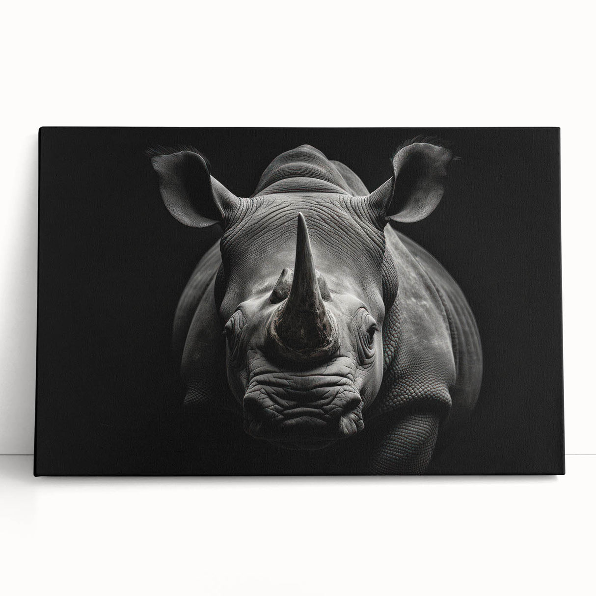 Stretched canvas featuring a striking rhinoceros wall art design, showcasing vibrant colors and detailed textures, perfect for wildlife enthusiasts and modern decor.