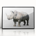 Framed wall art showcasing a striking black rhinoceros design, featuring intricate details and a sleek acrylic finish, perfect for enhancing modern decor.