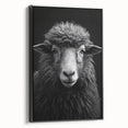 Framed wall art featuring a contemporary sheep design, showcasing intricate details and a sleek black frame, perfect for modern home decor. Ideal for animal lovers and art enthusiasts, this canvas adds a stylish touch to any interior space.