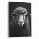 Framed wall art featuring a contemporary sheep design, showcasing intricate details and a sleek black frame, perfect for modern home decor. Ideal for animal lovers and art enthusiasts, this canvas adds a stylish touch to any interior space.