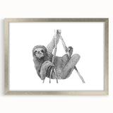 Framed wall art featuring a whimsical sloth design in a silver frame with a mat, showcasing vibrant colors and playful details, perfect for animal lovers' decor.