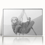 Framed wall art featuring a whimsical sloth design on a white background, showcasing vibrant colors and playful details, perfect for animal lovers and home decor enthusiasts.