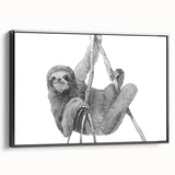 Framed wall art showcasing a sloth design on a black background, highlighting intricate details of the sloth's fur and expressive eyes, perfect for animal lovers.