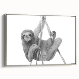 Framed wall art featuring a serene sloth design on canvas, set against a silver frame. This whimsical piece adds a touch of nature-inspired charm to any room.