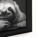 Close-up of a framed canvas wall art depicting a sloth in its natural habitat, showcasing vibrant greens and detailed textures, perfect for wildlife enthusiasts.