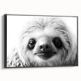Framed wall art featuring a sloth design on a black canvas, showcasing vibrant colors and intricate details, perfect for animal lovers and home decor enthusiasts.