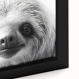 Close-up of a framed canvas wall art featuring a sloth design, showcasing vibrant colors and intricate details, perfect for wildlife enthusiasts and home decor.