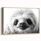 Framed wall art featuring a sloth design in a gold frame, showcasing vibrant colors and detailed textures, perfect for animal lovers and home decor enthusiasts.