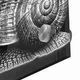 Close-up of a vibrant wall art piece featuring a colorful snail design on acrylic glass, showcasing intricate details and textures ideal for nature enthusiasts.