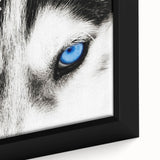 Close-up of a framed canvas wall art featuring a detailed wolf design, showcasing intricate fur textures and a serene forest background, ideal for nature lovers.