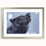 Framed wall art featuring a striking wolf design in a silver frame with a white mat, perfect for nature enthusiasts and wildlife decor lovers. Ideal for enhancing home or office interiors.