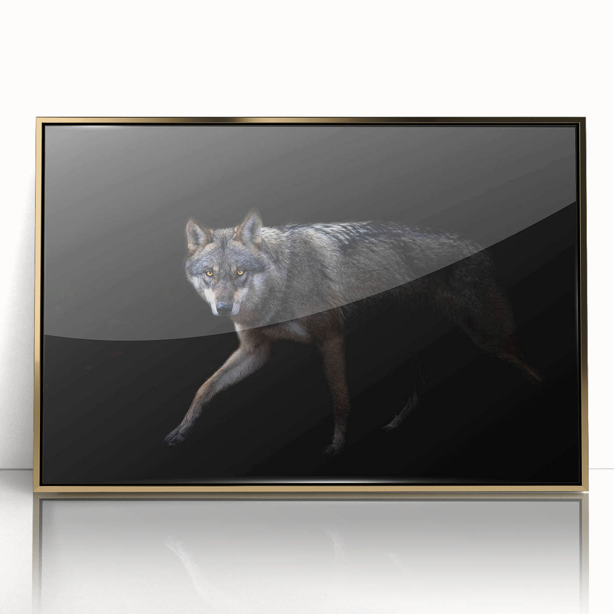 Framed wall art featuring a striking wolf design in gold accents, showcasing intricate details and textures, perfect for animal lovers and nature enthusiasts.