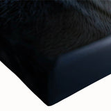 Close-up of a stretched canvas showcasing a striking wolf design in vibrant colors, ideal for wildlife enthusiasts and modern home decor, highlighting its intricate details and textures.