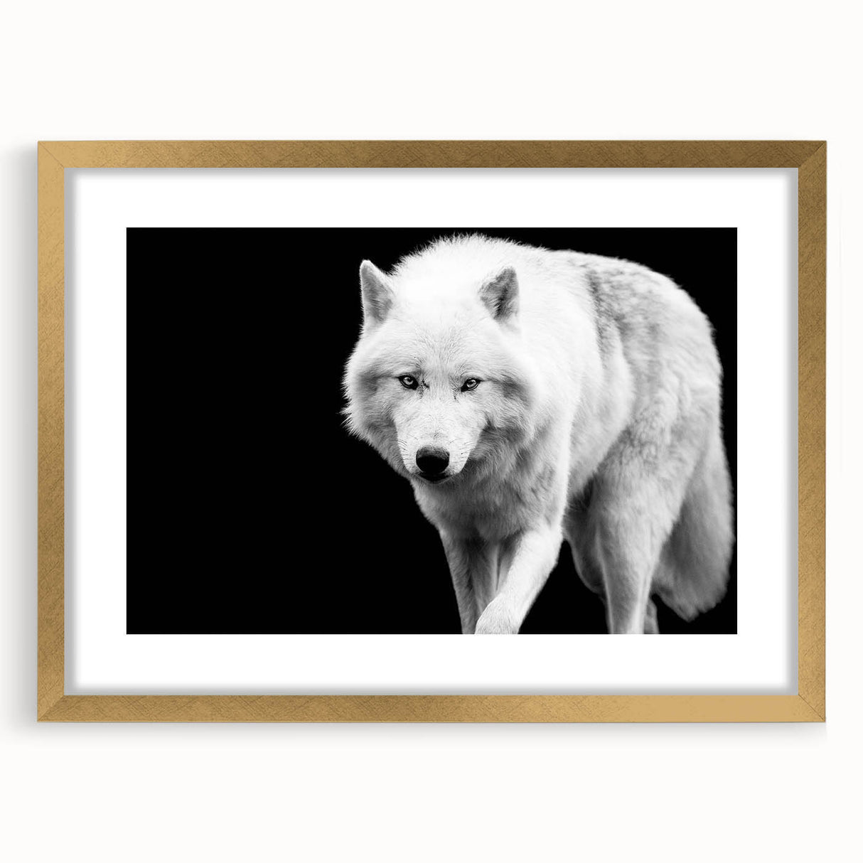 Framed wall art showcasing a majestic wolf design with a gold mat and frame, perfect for wildlife enthusiasts and nature-inspired decor. Ideal for home or office.