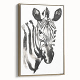 Framed wall art featuring a striking zebra design in black and white, set against a gold background, ideal for enhancing modern decor with wildlife themes.
