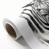 Zebra-themed wall art on rolled canvas, showcasing striking black and white patterns, perfect for enhancing modern decor in animal lovers' spaces.
