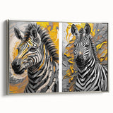 Framed canvas wall art showcasing a striking zebra design, featuring bold black and white stripes with a sleek silver frame, perfect for enhancing home decor.