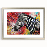Zebra-themed wall art collection framed in silver, showcasing a striking black and white zebra design against a textured mat background, perfect for wildlife enthusiasts.