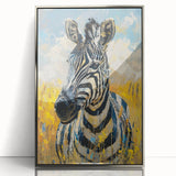 Framed acrylic wall art showcasing a striking zebra design, featuring bold black and white stripes, set in a sleek silver frame, ideal for wildlife-themed decor.