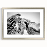 Zebra-themed wall art framed in silver with a mat, showcasing a vibrant wildlife design suitable for modern home decor, perfect for animal lovers.