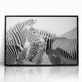 Framed acrylic wall art featuring a striking zebra design in black and white, showcasing the unique patterns of the animal against a sleek, modern backdrop. Ideal for enhancing contemporary decor with a touch of wildlife elegance.