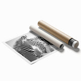 Zebra wall art print showcasing a striking black and white striped design ideal for wildlife-themed decor, rolled for easy shipping and display. Perfect for animal lovers or home decor enthusiasts.
