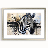 Framed wall art featuring a striking zebra design in black and white, set in a silver frame with a mat, perfect for adding a modern touch to home decor.
