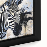 Close-up of a framed canvas wall art piece depicting a striking black and white zebra design, showcasing intricate details and textures, perfect for wildlife enthusiasts.