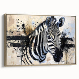 Framed canvas wall art showcasing a striking zebra design in black and white, adorned with elegant gold accents, perfect for modern decor styles.