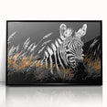Framed acrylic wall art featuring a striking zebra design, ideal for wildlife enthusiasts, with a sleek black frame enhancing the modern decor aesthetic.