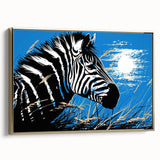 Framed canvas wall art featuring a striking zebra design, showcasing bold black and white stripes with a gold frame, ideal for modern decor in living spaces.