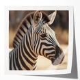 Stylish wall art featuring a vibrant zebra design, showcasing bold black and white stripes on a glossy surface, perfect for animal lovers and modern decor.