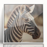 Framed wall art showcasing a striking zebra design in monochrome, featuring sleek acrylic framing and a clean white border, perfect for modern decor.