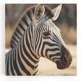 Zebra wall art canvas featuring a vibrant, detailed design of a zebra in a natural setting, perfect for enhancing home decor with a wild animal theme.