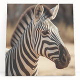 Zebra-themed wall art on stretched canvas, showcasing bold black and white stripes, perfect for modern decor. Ideal for animal lovers and art enthusiasts.