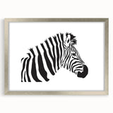 Zebra-themed wall art frame showcasing a striking black and white zebra design, elegantly bordered in silver, perfect for wildlife enthusiasts and modern decor.