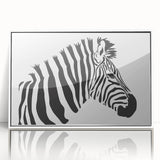 Framed wall art showcasing a striking zebra design in vivid black and white, perfect for adding a modern touch to home decor. Ideal for animal lovers and art enthusiasts.